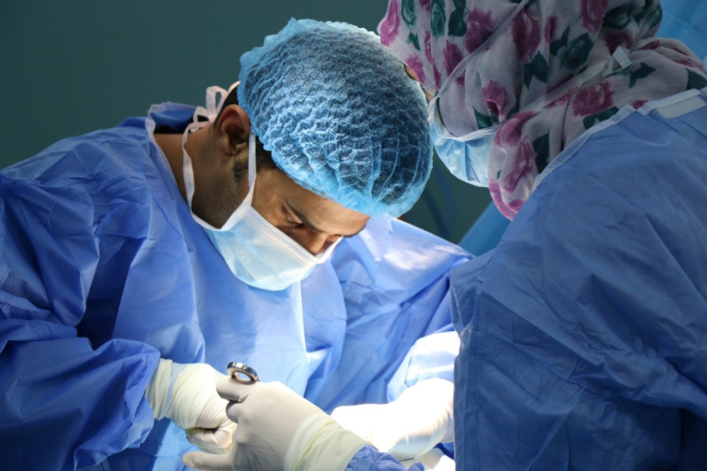 Surgeons working together during a procedure
